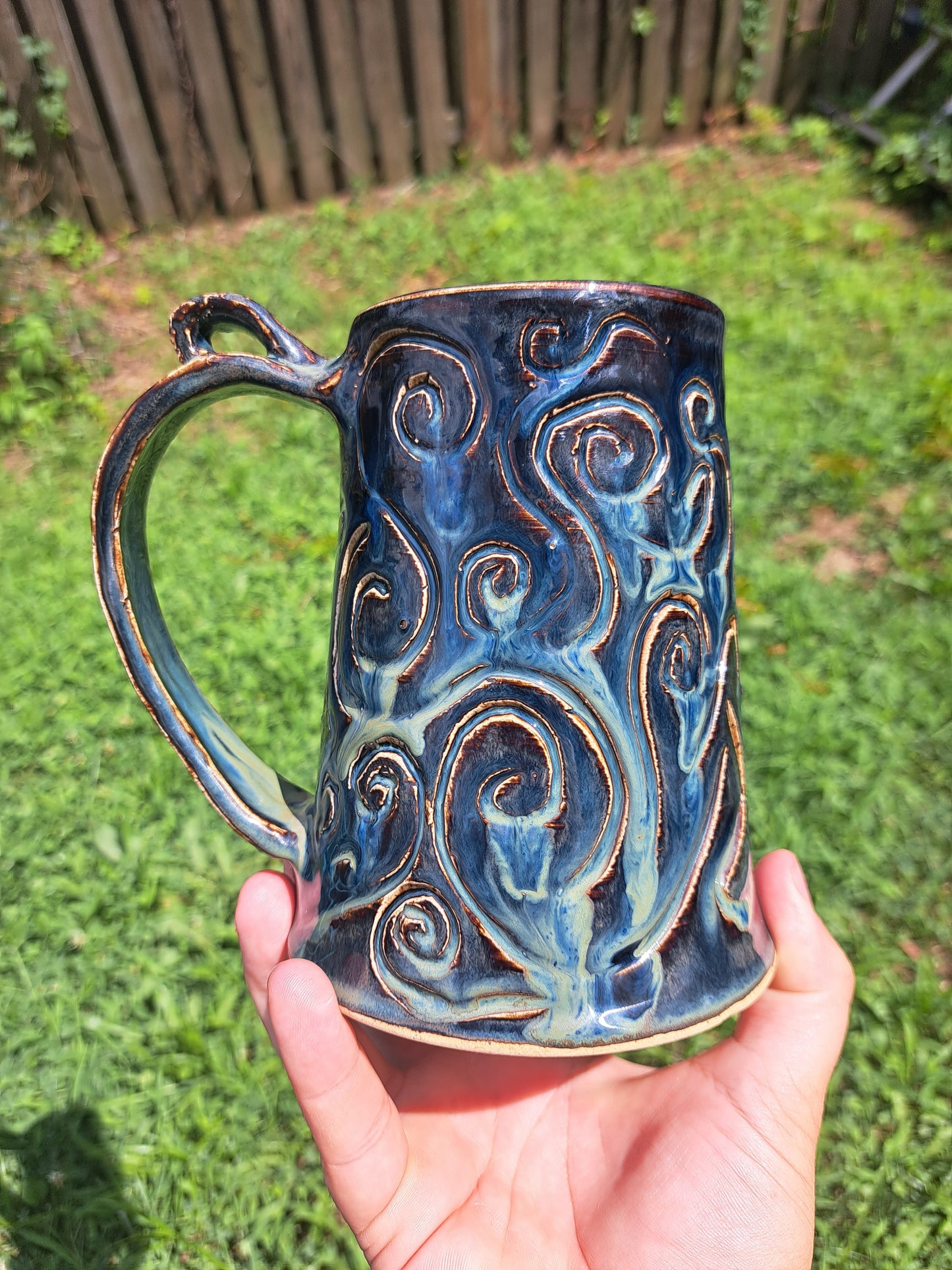 Stein, 112, floating blue, carved