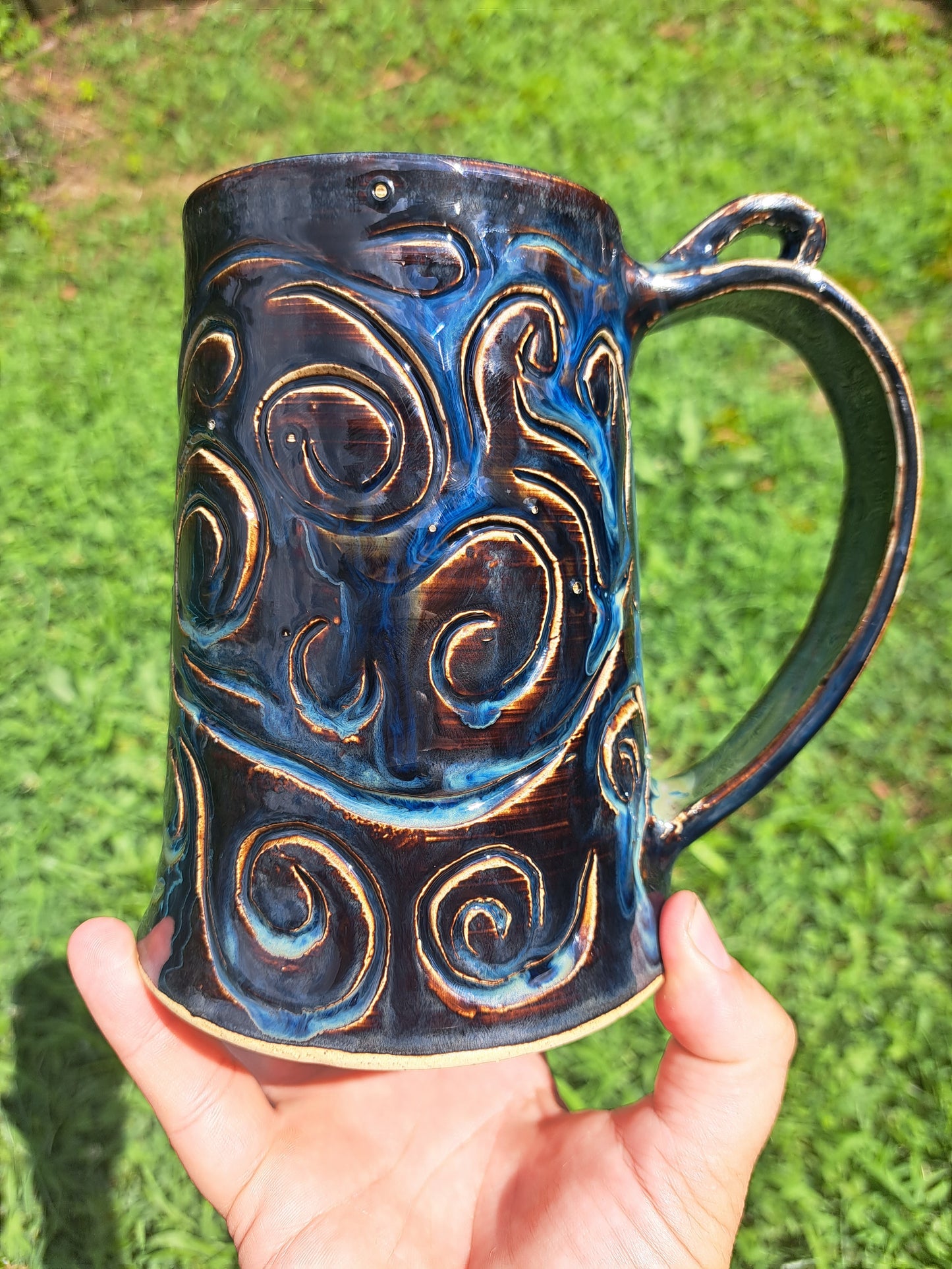 Stein, 112, floating blue, carved