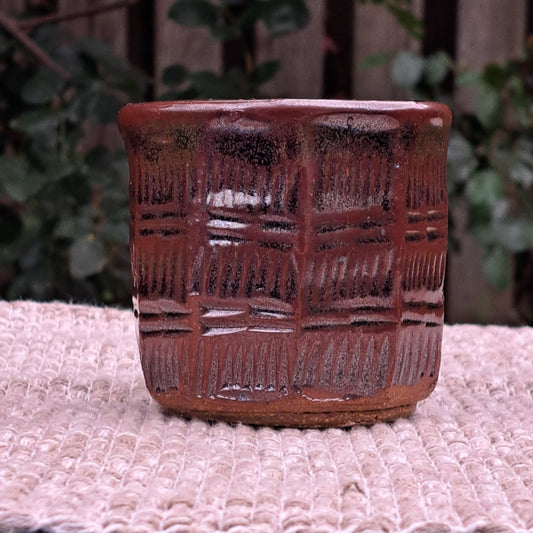 Cup, carved, reduct-fired, Temmoku, facets and lines